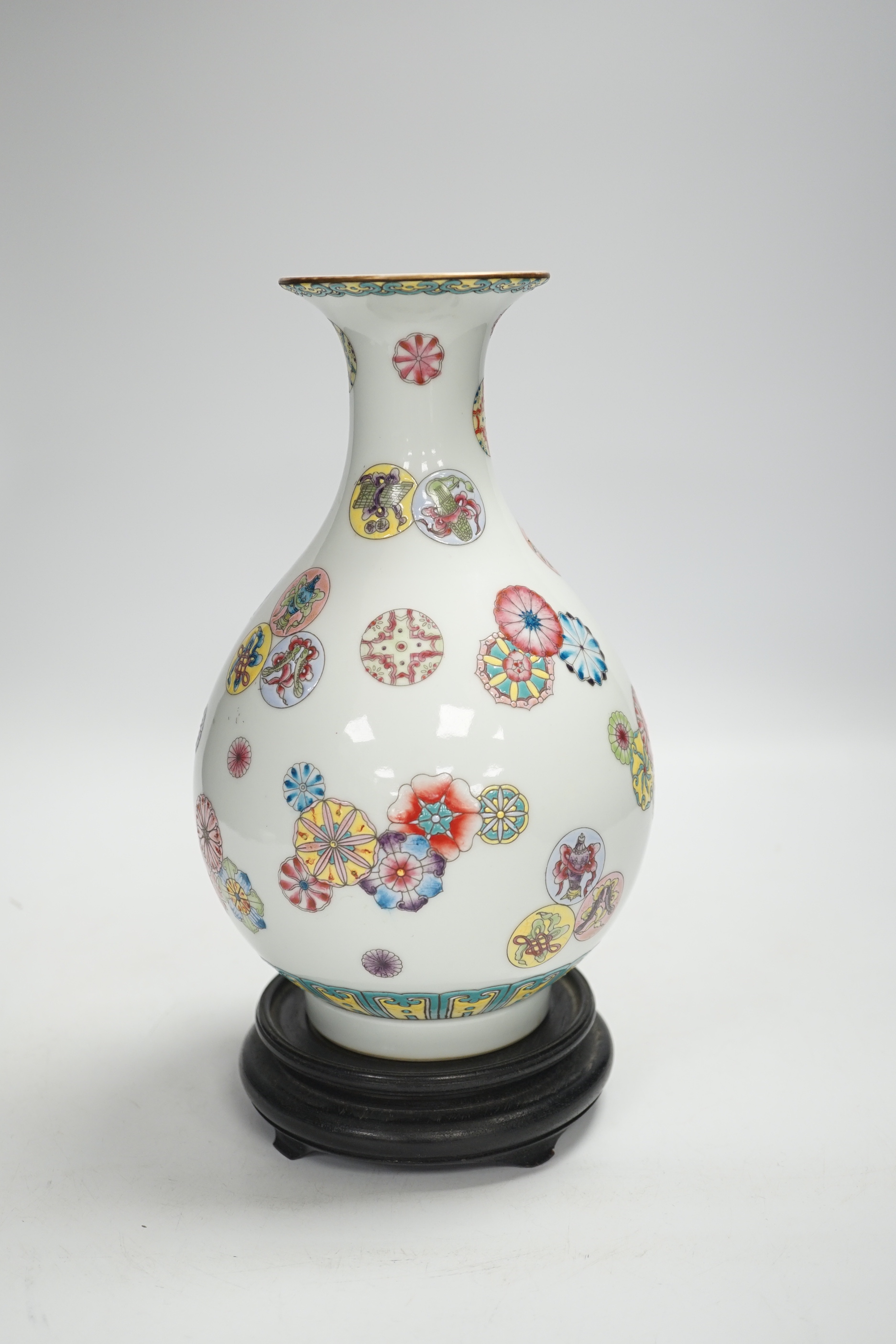 A Chinese famille rose vase, on hardwood stand, overall 27cm high